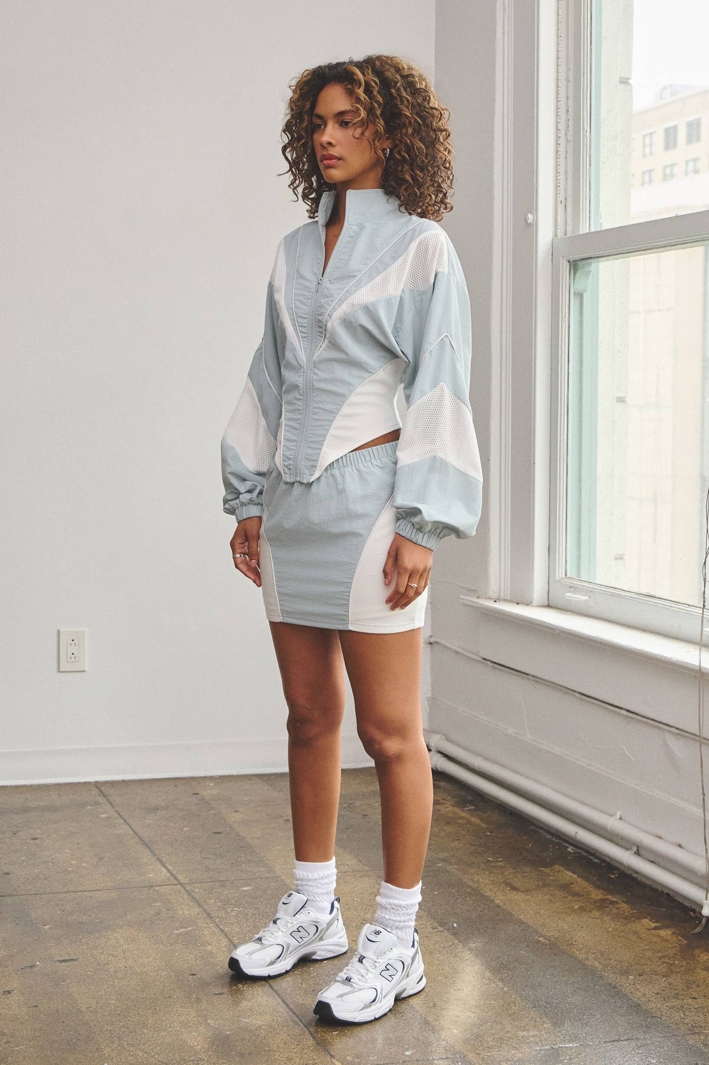 Nylon & mesh contrast track suit top & mini skirt set